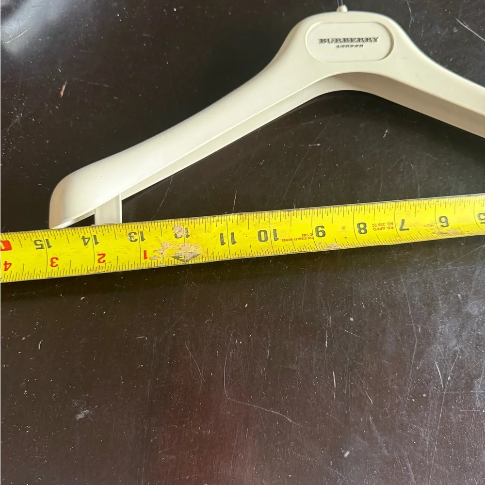 Burberry Cream White Plastic Hanger with Raised Logo